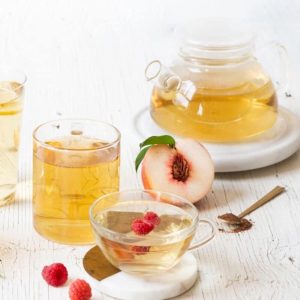 Cups and pot of Herbalife Nutrition Instant Herbal Tea
